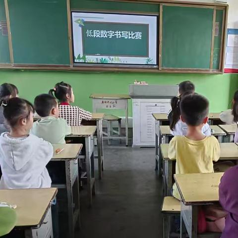 争做弄潮儿 书写规范字 ——孟塬镇中心小学低段数字书写比赛