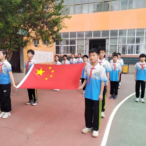 国旗飘扬，伴我成长——任固育才学校升旗仪式