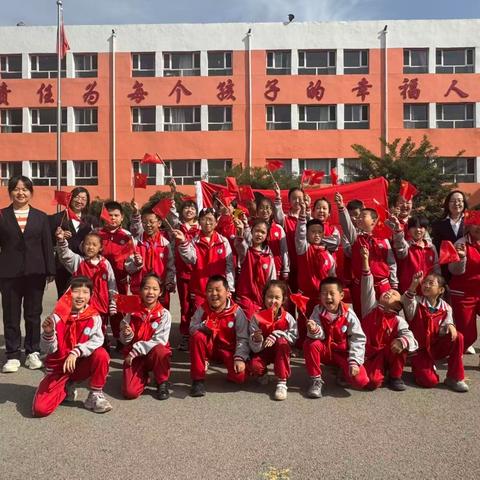 云冈区口泉二校举行“向国旗敬礼，唱祖国赞歌”迎国庆系列活动