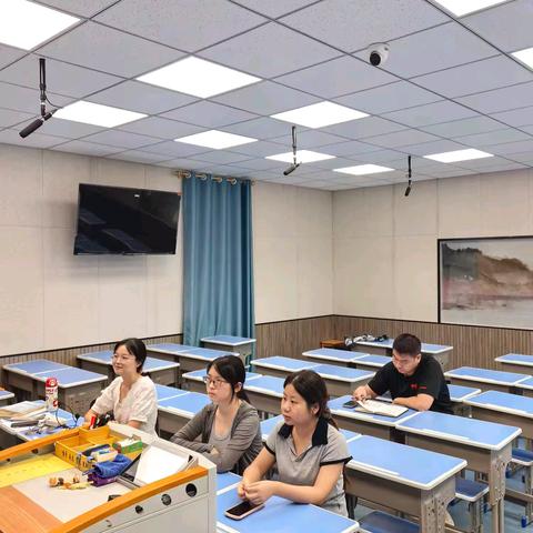 研说教材促成长，英语教师展风采——港口学校英语组“研课标、说教材”活动