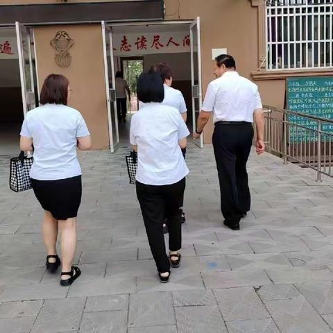 互相学习，共同提高——前往兄弟学校交流学习