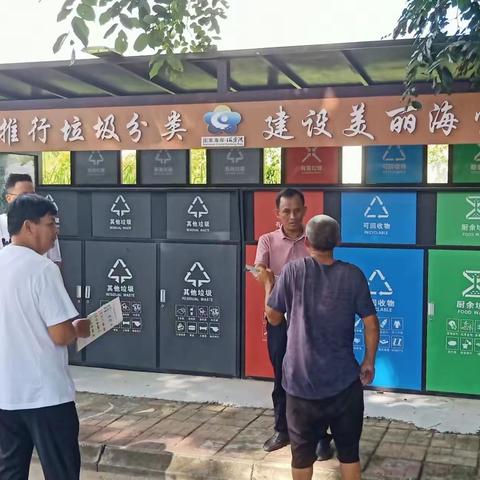 海丰村委会组织党员职工开展垃圾分类宣传