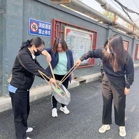 圆明园东里社区开展“爱国卫生大扫除”活动
