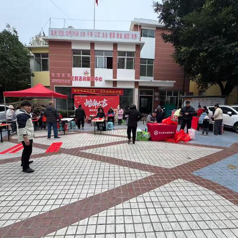 卧龙街道卧龙社区新时代文明实践“我们的节日·春节”--墨香四溢迎新春 书写春联送万福