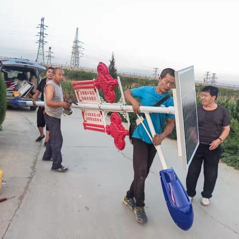 安装路灯暖民心，照亮群众幸福路