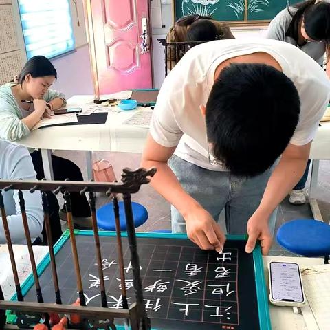 《翰墨书五一，师生展才情——无量寺乡初级中学师生书法比赛纪实》