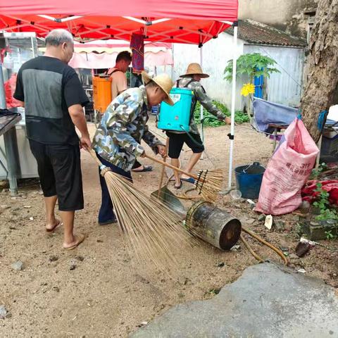 陀烈村开展“两热”防控及翻盆倒罐工作