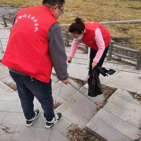 河西街道幸福社区新文明实践站开展爱护环境卫生志愿服务活动