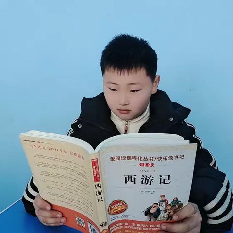 蛇舞新春 乐享寒假——五年级四班假期快乐阅读、练字活动