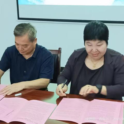 墨香暖邻里 共绘和谐景——临潼区老年书画学会入住姜寨社区签约仪式