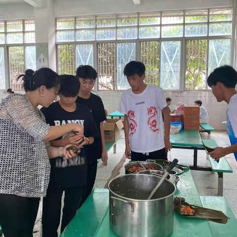 粽叶飘香，一举高“粽”                                                 ———湛江市体育学校初三（2）班包粽子活动