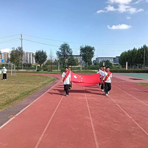 “心向阳光   一路芬芳”——郑州航空港区科技一街小学第四周升旗仪式