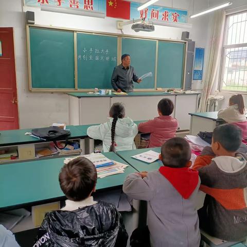 冯老庄小学小手拉大手，共创文明城活动总结