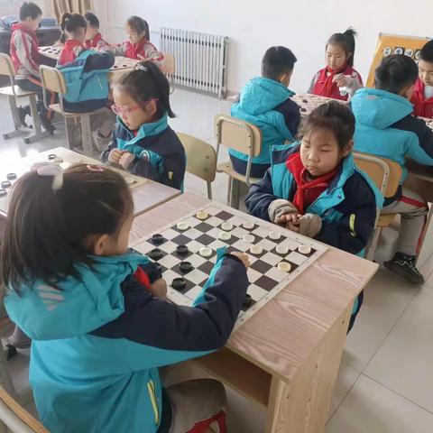 快乐对弈   “棋”乐无穷 ——凤凰城小学国际跳棋练习赛