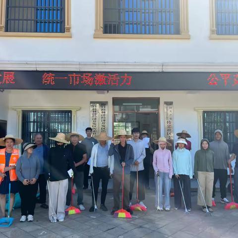 传忠社区开展周末爱国卫生活动