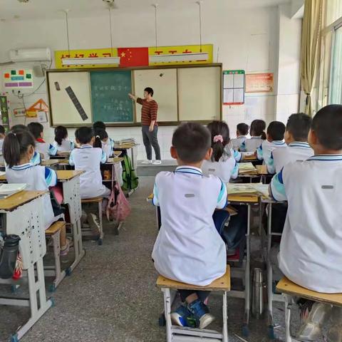 贾镇二十里铺小学开展“劳动实践   亲子共行”一系列活动
