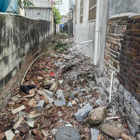 “为民办实事”整改卫生死角建硬化水泥路