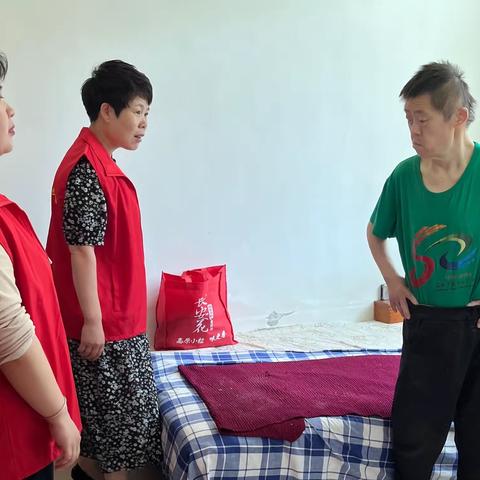 向阳街道文昌阁社区 “扶残助残我先行，共建有爱大家庭”关爱残疾人活动