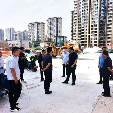 区住建局参观学习建筑扬尘污染防治工作