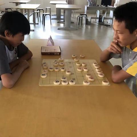 “弈”趣盎然，乐在“棋”中                            ——丰山初级中学象棋比赛