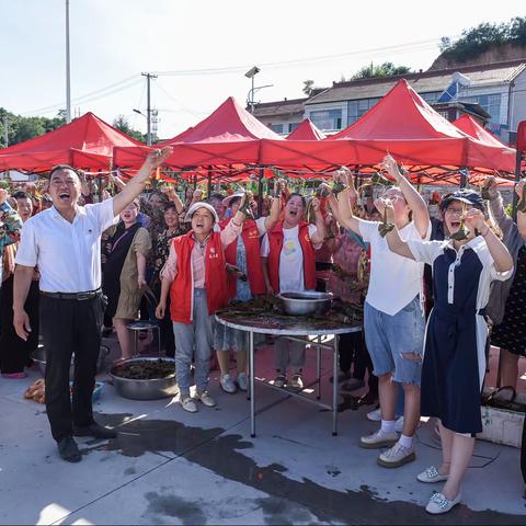 辛安泉镇西流南村举办“品味端午，传承文明”一一共度“端午节”活动