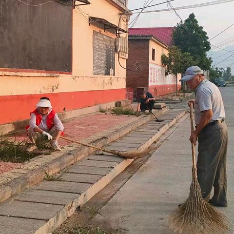 七贤镇丁村周六人居环境整治活动