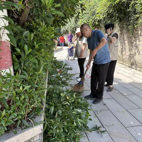 九彩社区开展“爱河护水，清洁家园”活动