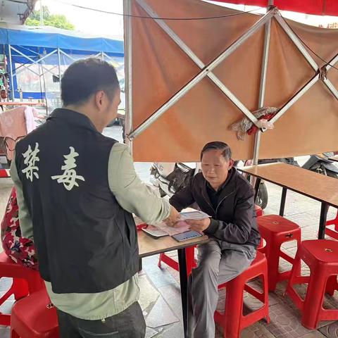 兴业社区禁毒宣传进商铺活动