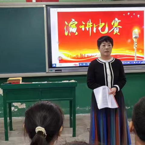 午汲镇均河小学举行“国旗在我心”演讲比赛