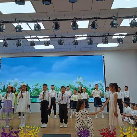 【十一小·教学】利通区第十一小学四年级“轻叩诗歌的大门 体验诗歌的魅力”读书交流展示