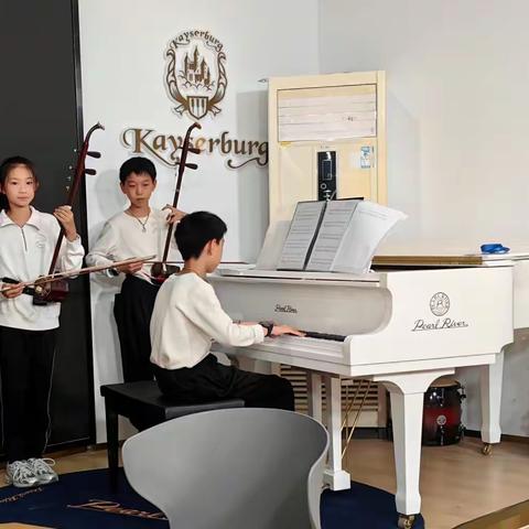 音声清绕梁 风悦丛中赏 ——记金师附小六（1）班“音悦心仪”梦想团队排练活动
