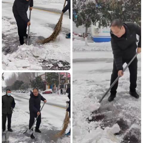 满城银装一夜来 扫雪除冰保畅通