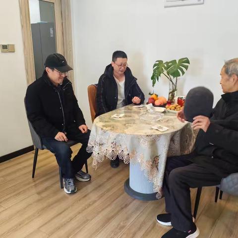 长安农机管理站开展春节慰问退休职工活动