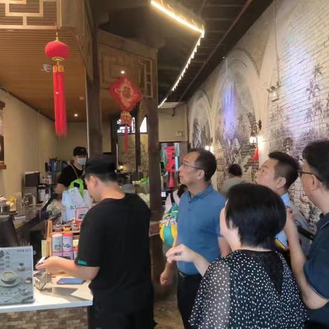 龙华区市场监督管理局在骑楼中山路开展调研工作