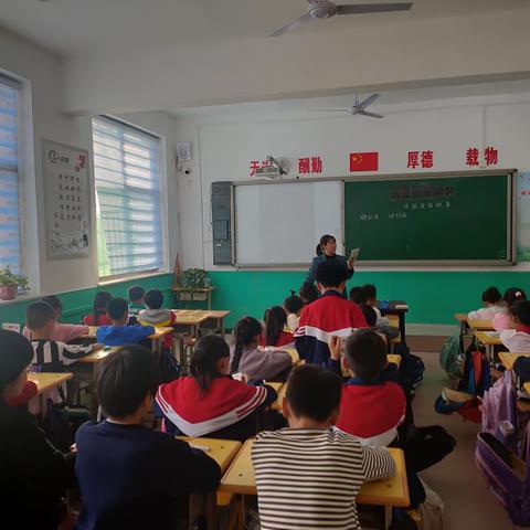 共读一本书，齐思共成长———南化小学导读课活动