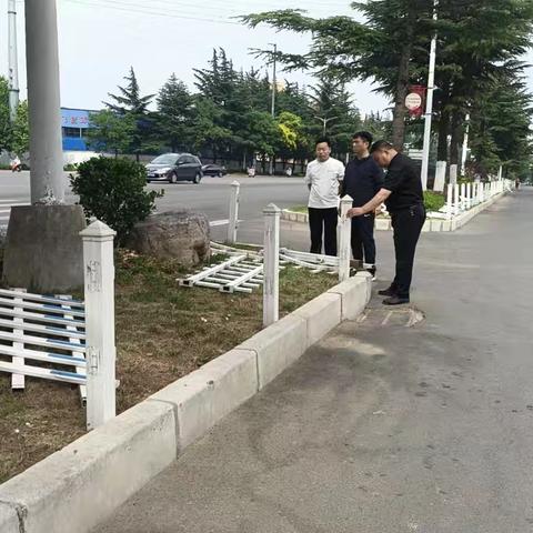 义马市城市管理局                端午绿化管护忙  只待街景换新颜