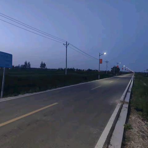 筑梦乡村振兴，点亮快乐前程！——快乐村道路硬化亮化工程