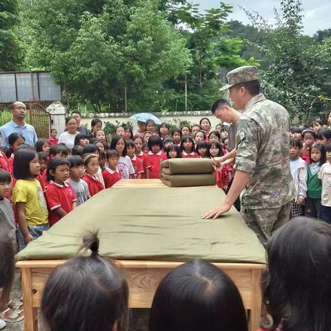 国防教育润童心   红色基因永相传———芒海镇九年制学校