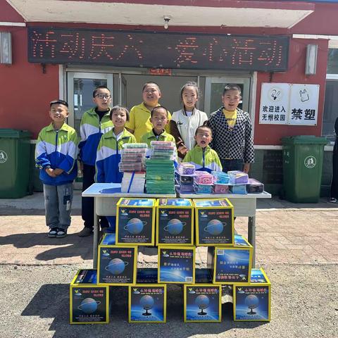 爱心助学，情暖六一——乐山镇莲花小学党员及积极分子开展爱心助学活动。