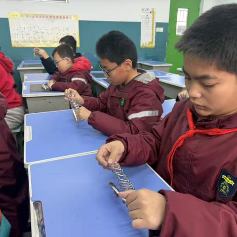 妙手巧解九连环——五年级九连环社团