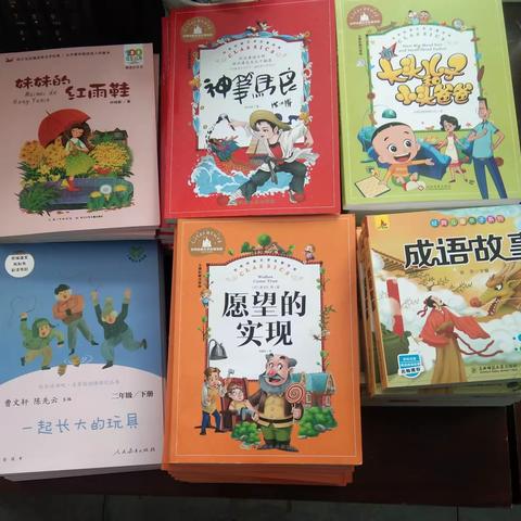 图书漂流“品”书香     童年阅读“悦”快乐                      东关小学二年级图书漂流活动