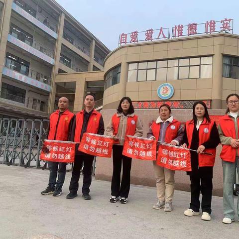 坚守护学岗，温暖上学路——金凤路初级中学907班护学岗