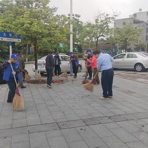 屯昌县交通运输和地方公路事务中心组织党员干部职工开展“小屯妹 大昌叔 周末大扫除”活动