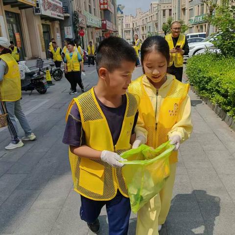 堰北社区信用办开展“小手拉大手，共建美丽家园”儿童志愿服务活动