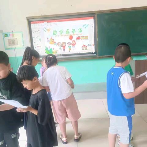 无纸化乐考嘉年华 二年级萌娃智慧大闯关 ——码头镇团结村小学