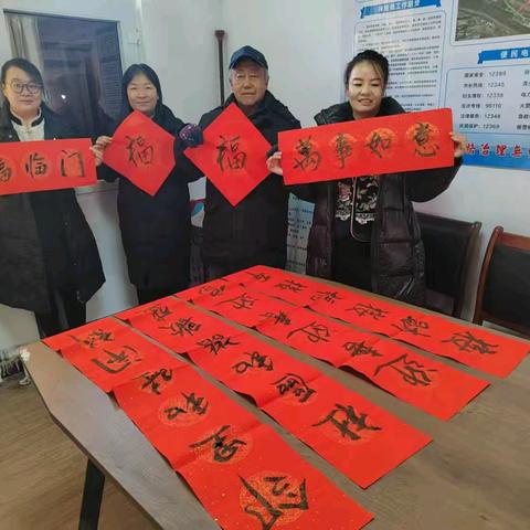 新开路社区开展“喜迎新春送祝福”写春联、剪纸活动