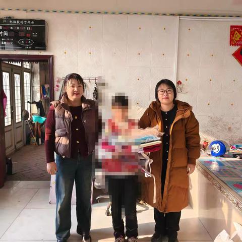 青龙山镇妇联、青龙山学区中心校护童之家寒假关爱走访活动