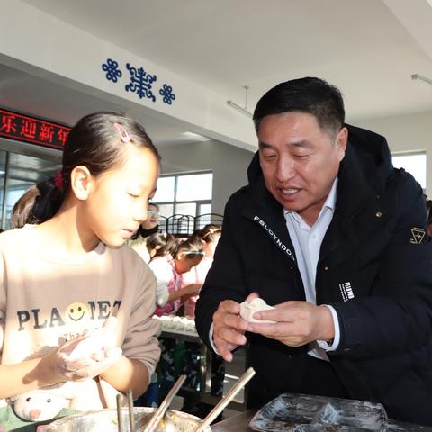 图牧吉中心学校 “师生齐动手，快乐迎新年” 包饺子庆元旦活动纪实