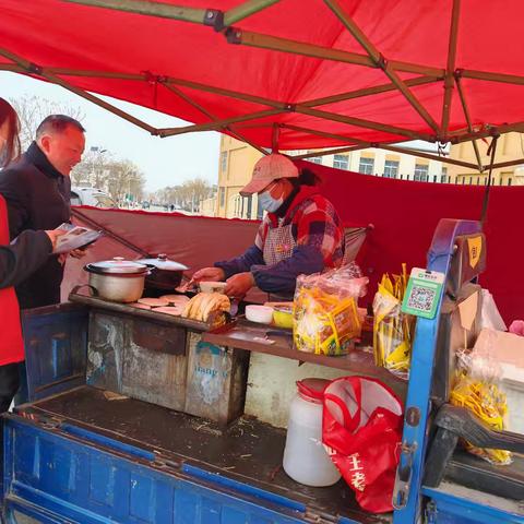 东明农商银行长兴支行开展反电信诈骗宣传活动