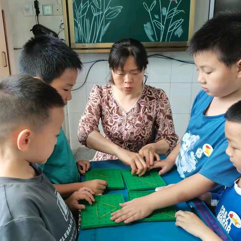 趣味大闯关 乐评助成长——泸县海潮镇学校开展一、二年级核心素养测评活动